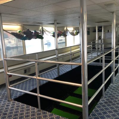 a boat sitting on top of a building